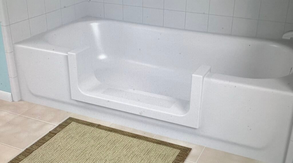 White CleanCut Step installed in the side wall of an existing bathtub