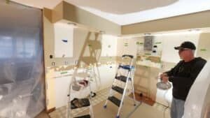 Worker shown during kitchen remodeling